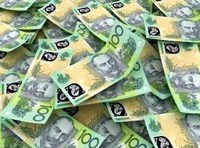 Australian dollar slides below parity