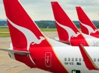 Fair Work orders Qantas to reinstate flight attendants who were sacked for allegedly misusing Cabcharge cards