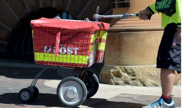 Australia Post to cut 2000 jobs as it pushes for move to slower mail service