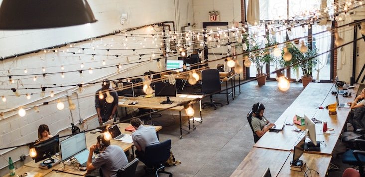 Interior shot, people working in modern office