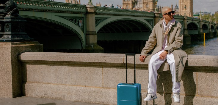 July luggage Thames riverside photo, Big Ben in background