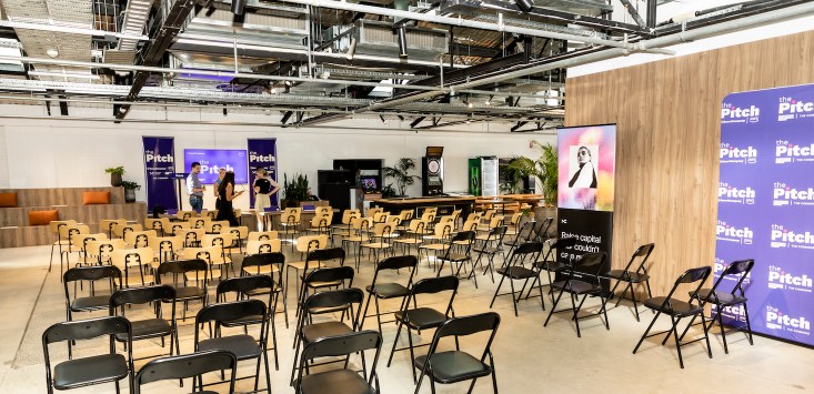 the Pitch Melbourne venue shot, empty chairs startup photographed before the event